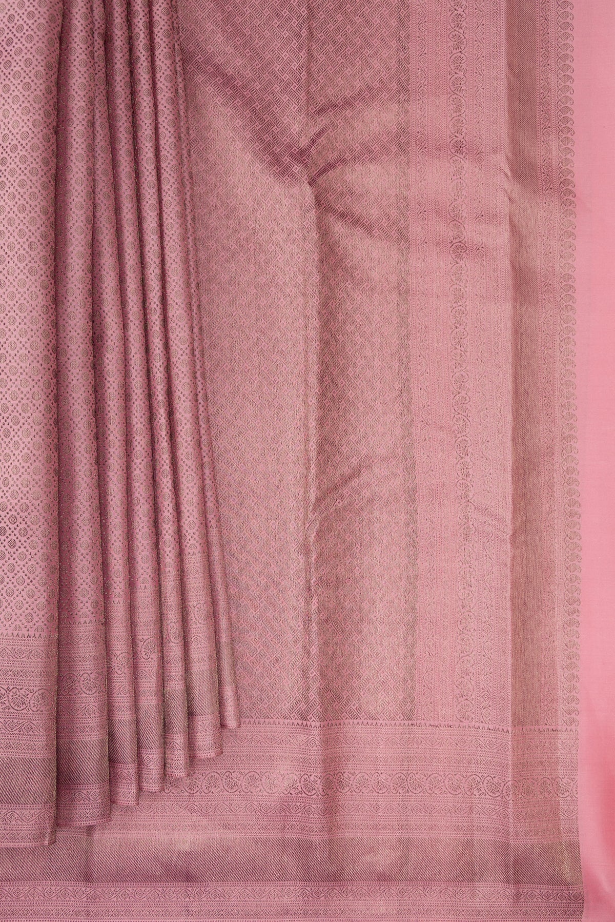 Pleats and pallu of Pure Silk Rose Gold Dual Tone Kanjivaram Saree with Zari Brocade on the body and Fancy Border. 
