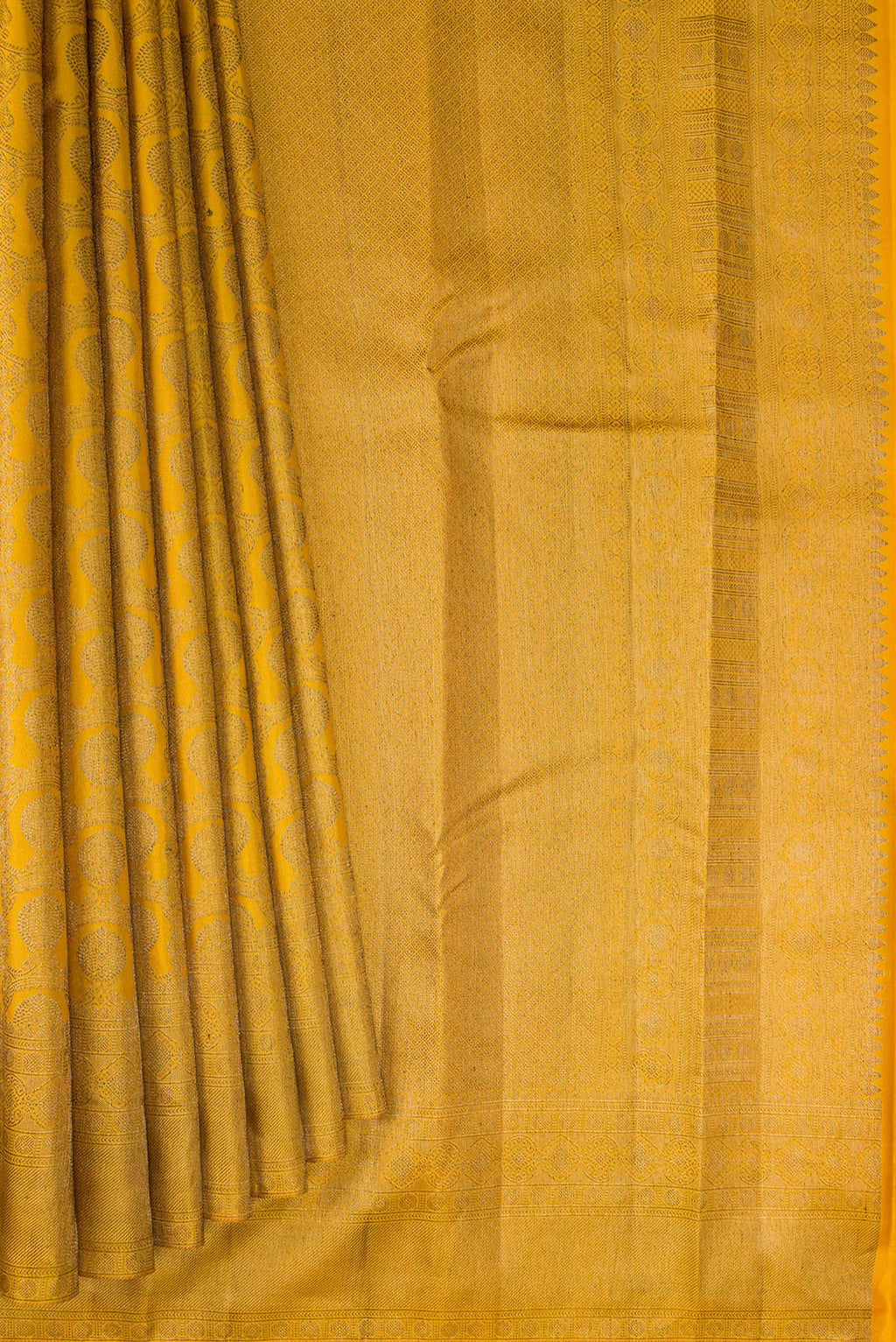 Pleats and pallu of Pure Silk Mustard Kanjivaram Saree with Zari Brocade on the body and Zari Border. 