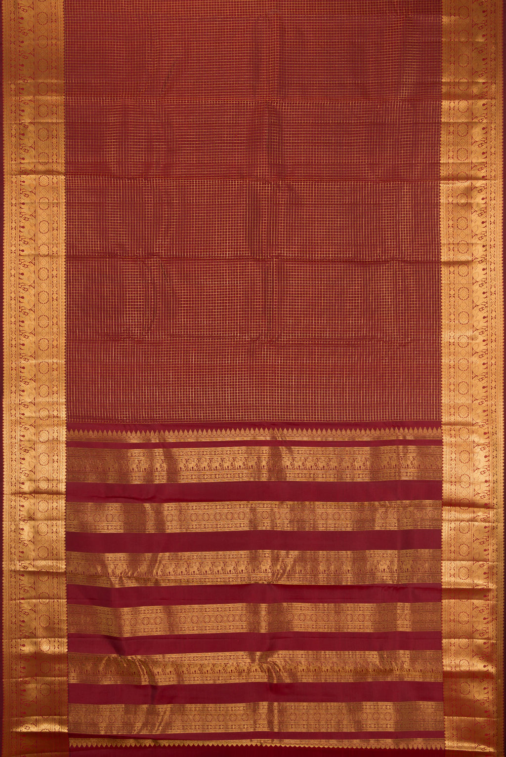 Flat view of Maroon Kanjivaram Silk Saree with Checked design on the body and Zari Border. 