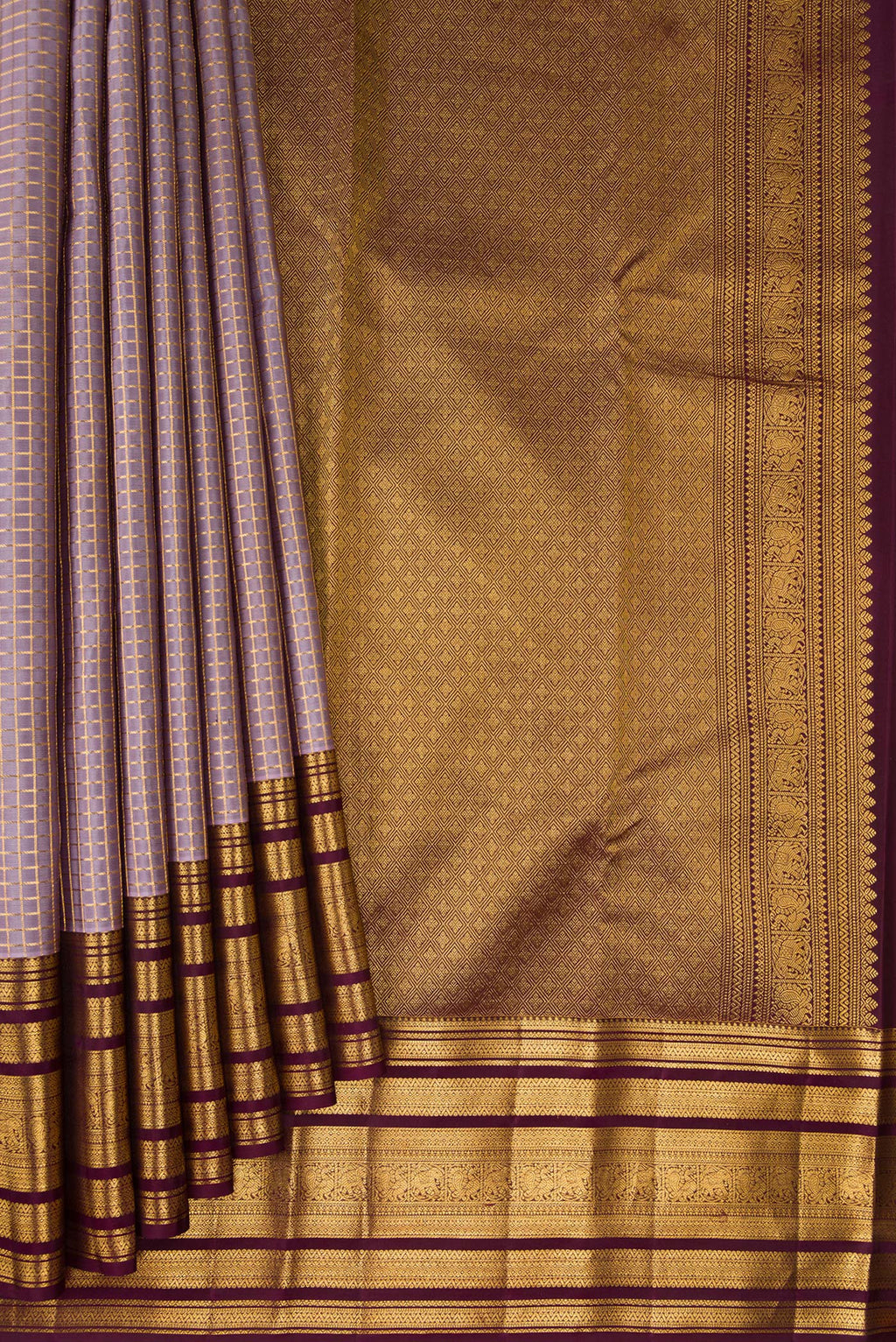Pleats and pallu of Lilac Kanjivaram Silk Saree with Checked design on the body and Zari Border. 