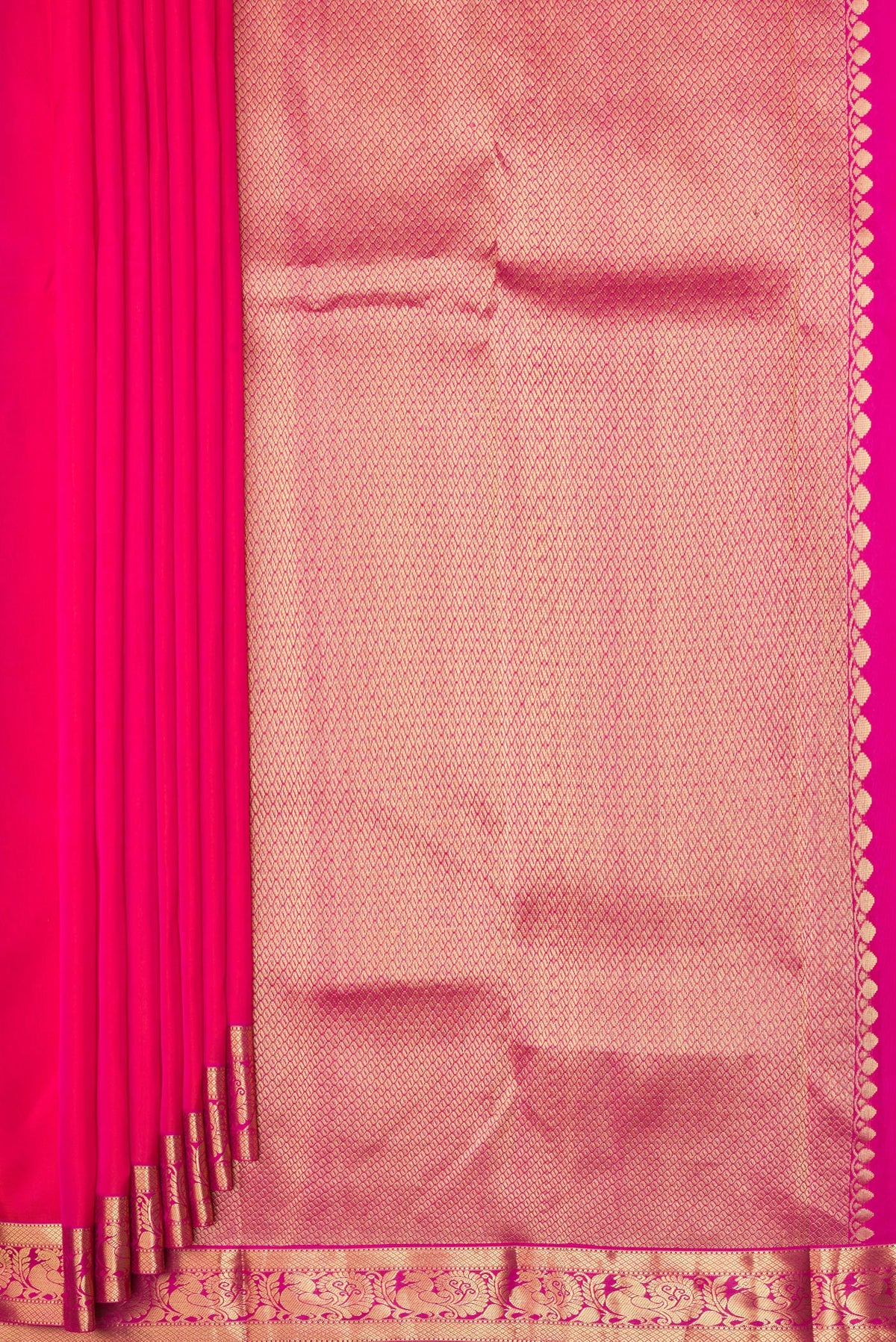 Pleats and pallu of Pure Silk Coral Dual Tone Kanjivaram Saree with Plain Body and Zari Border. 