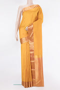 Pure Silk Yellow Kanjivaram Saree with Plain Body and Zari Border.  displayed on a mannequin