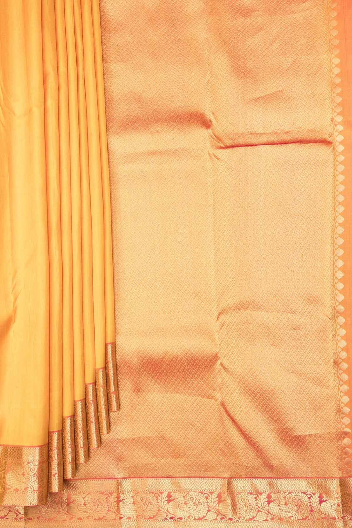 Pleats and pallu of Pure Silk Yellow Kanjivaram Saree with Plain Body and Zari Border. 