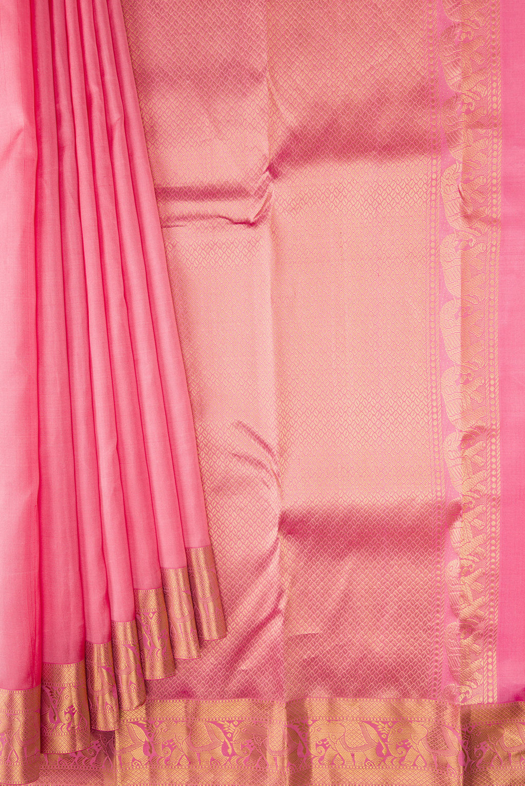 Pleats and pallu of Rose pink Kanjivaram Silk Saree with Plain Body and Zari Border. 