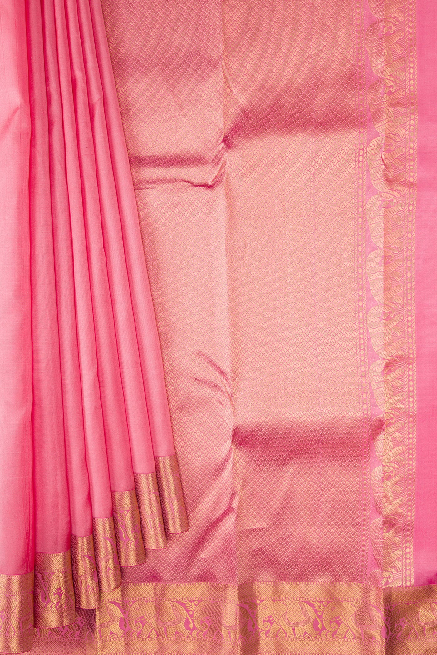 Pleats and pallu of Rose pink Kanjivaram Silk Saree with Plain Body and Zari Border. 