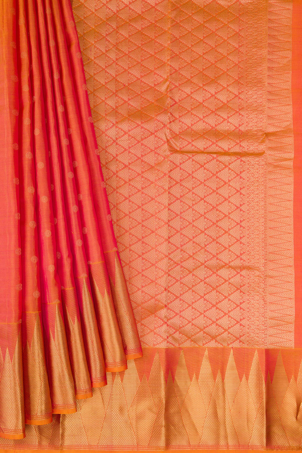 Pleats and pallu of Gold Dual Tone Kanchipuram Silk Saree with Zari Butta on the body and Fancy Border. 