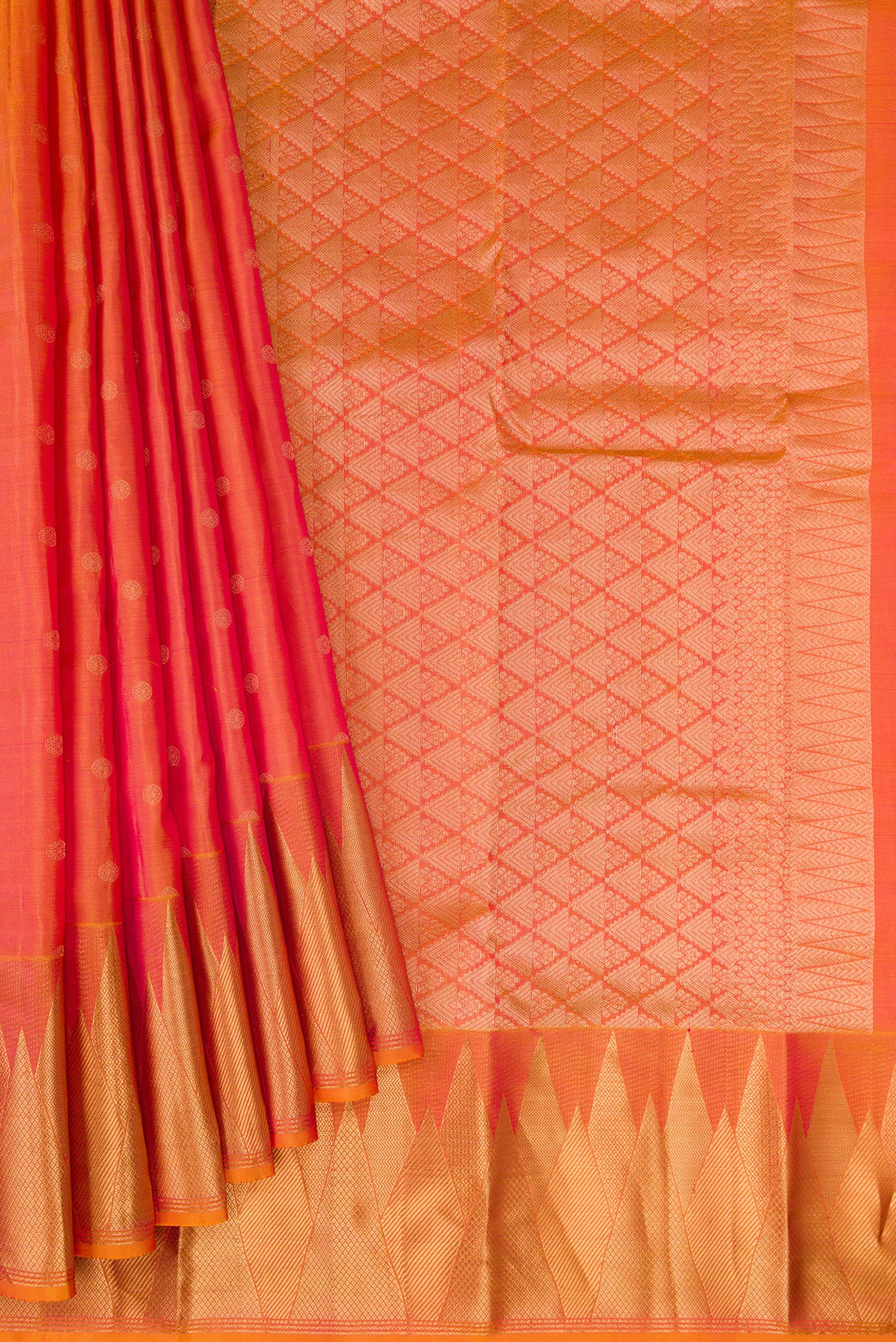 Pleats and pallu of Gold Dual Tone Kanchipuram Silk Saree with Zari Butta on the body and Fancy Border. 