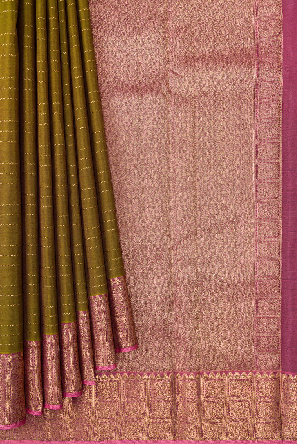 Pleats and pallu of Mehandi Green Kanchipuram Silk Saree with Veldhari on the body and Zari Border. 