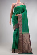 Bottle Green Dual Tone Kanchipuram Silk Saree with Veldhari on the body and Zari Border.  displayed on a mannequin