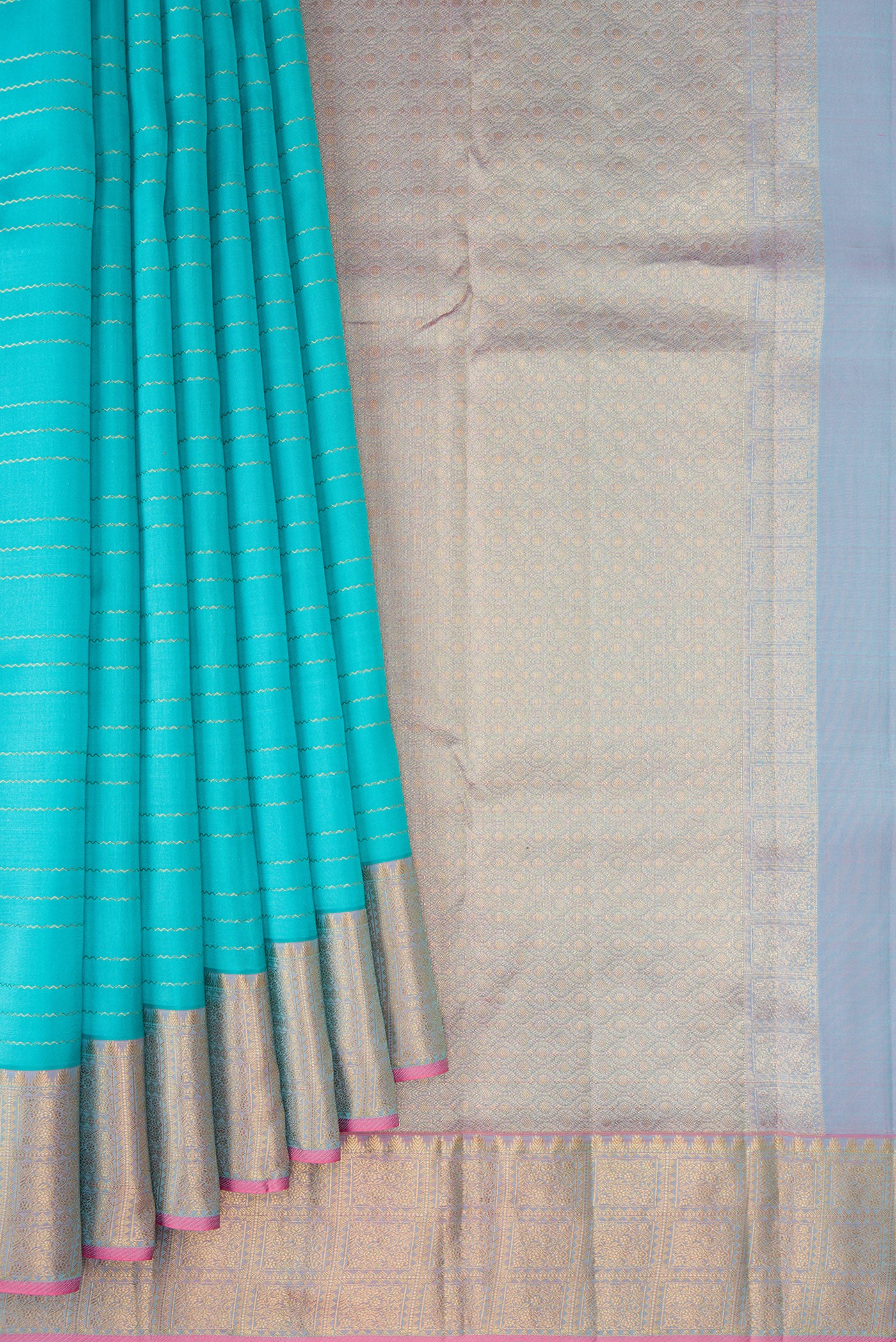 Pleats and pallu of Sky Blue Kanchipuram Silk Saree with Veldhari on the body and Zari Border. 