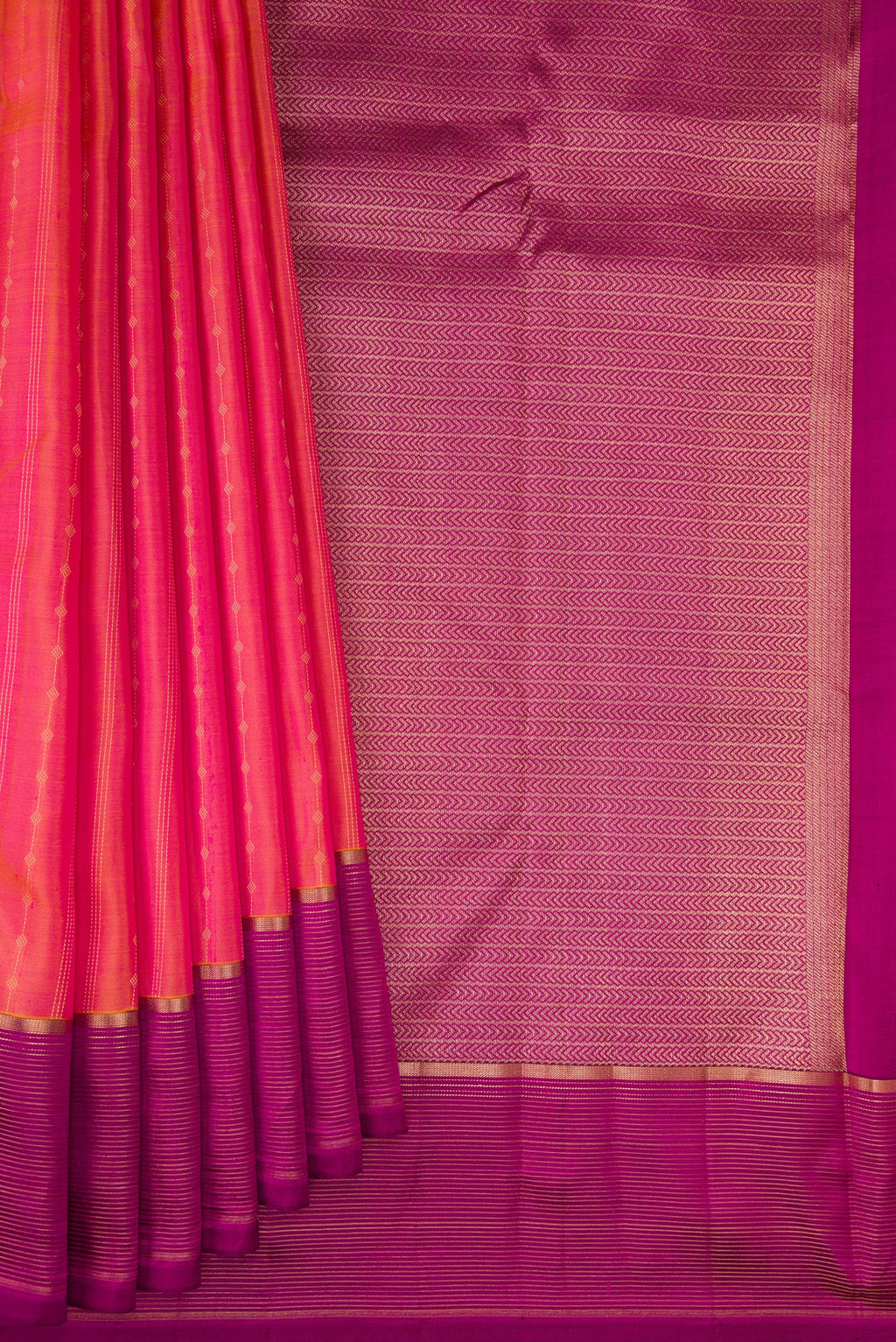 Pleats and pallu of Pink Dual Tone Kanchipuram Silk Saree with Stripes on the body and Plain Border. 