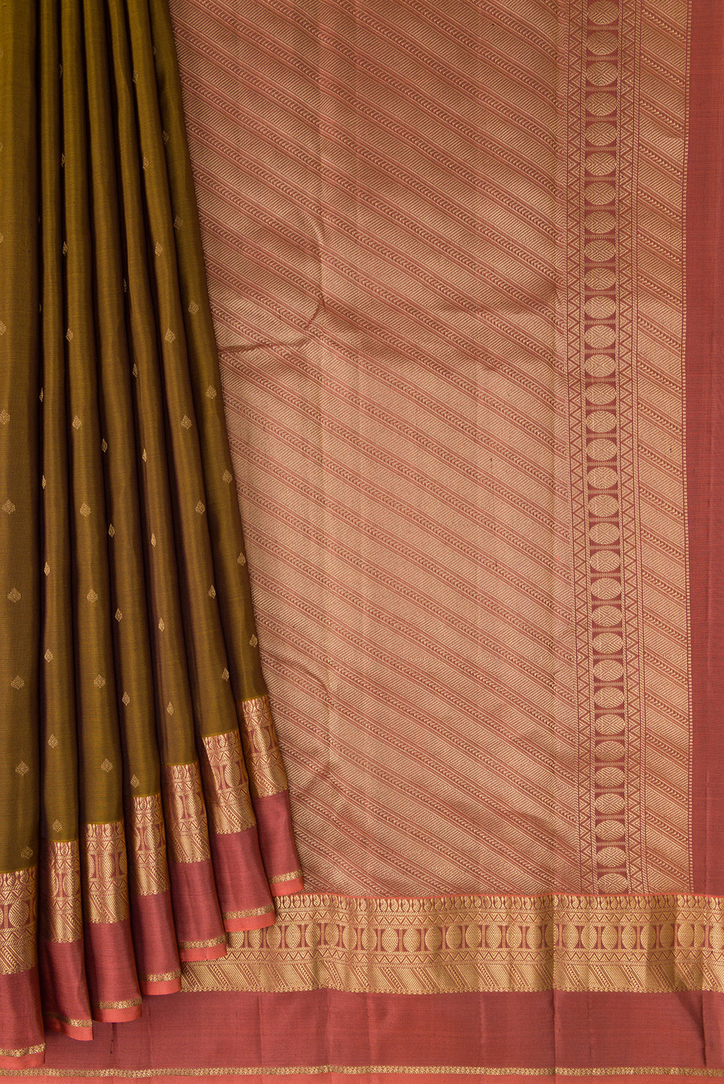 Pleats and pallu of Mehandi Green Kanchipuram Silk Saree with Zari Butta on the body and Zari Border. 