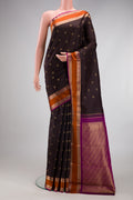 Coffee Brown Kanchipuram Silk Saree with Zari Butta on the body and Zari Border.  displayed on a mannequin