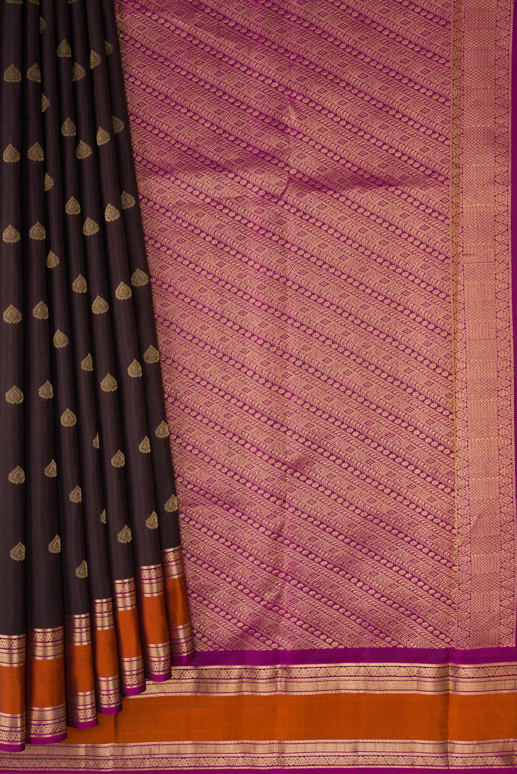 Pleats and pallu of Coffee Brown Kanchipuram Silk Saree with Zari Butta on the body and Zari Border. 