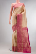 Cream Kanchipuram Silk Saree with Stripes on the body and Zari Border.  displayed on a mannequin