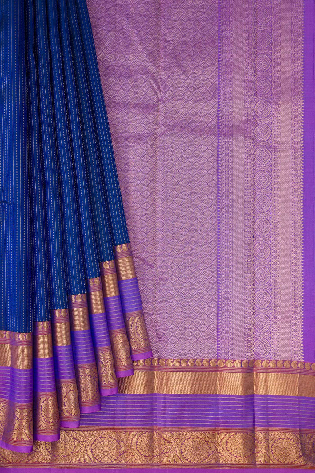 Pleats and pallu of Navy Blue Dual Tone Kanjivaram Silk Saree with Stripes on the body and Fancy Border. 