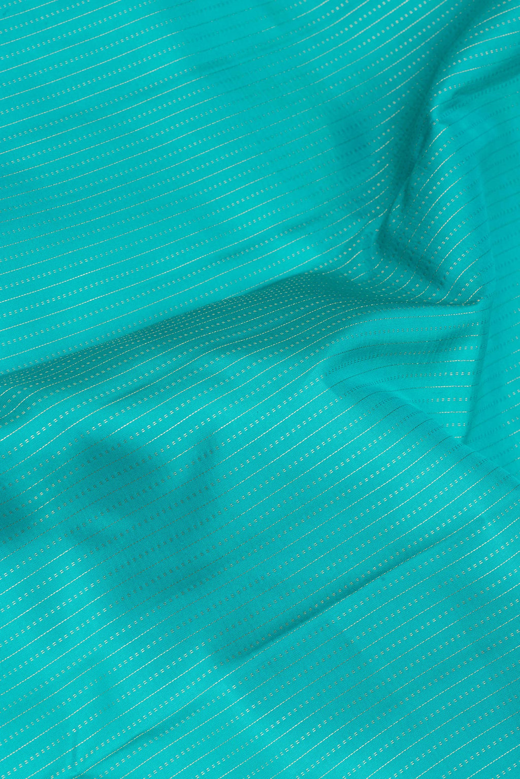 Close up of Sky Blue Kanjivaram Silk Saree with Stripes on the body and Zari Border.  displaying folds