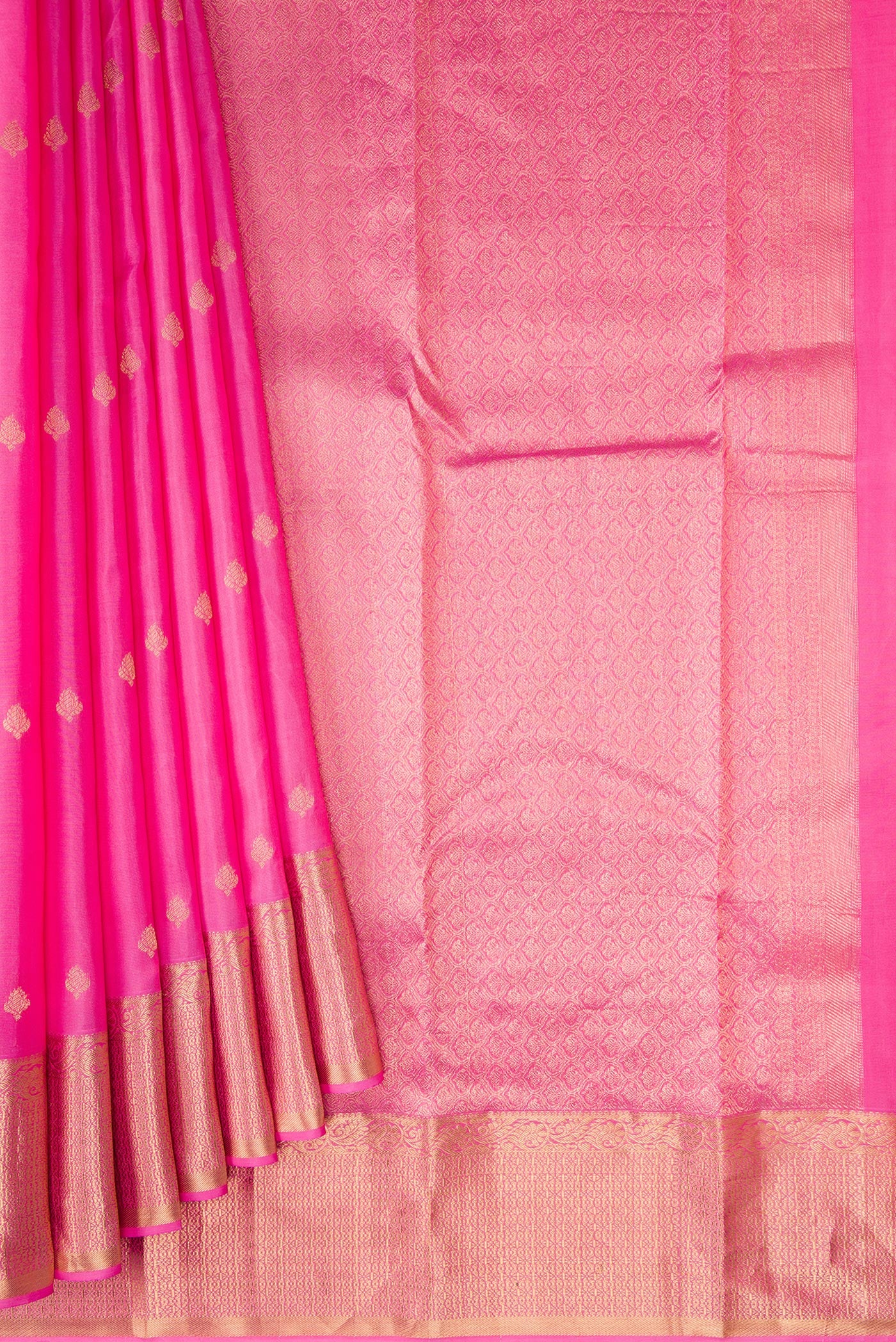 Pleats and pallu of Pink Kanchipuram Silk Saree with Zari Butta on the body and Zari Border. 