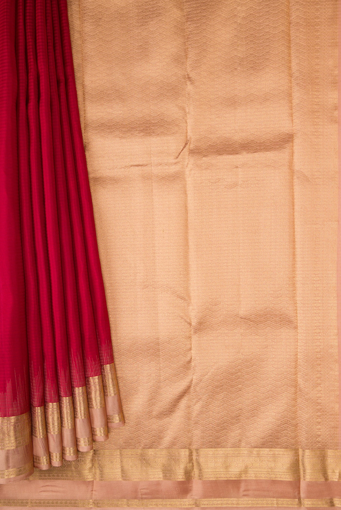 Pleats and pallu of Maroon Kanchipuram Silk Saree with Stripes on the body and Zari Border. 