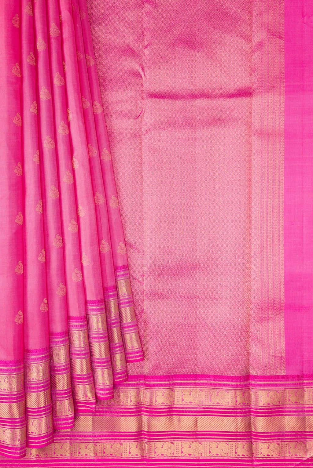 Pleats and pallu of Pink Kanchipuram Silk Saree with Zari Butta on the body and Zari Border. 