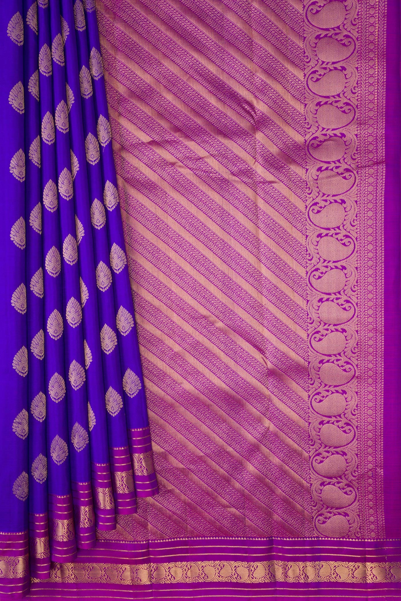 Pleats and pallu of Royal Blue Kanchipuram Silk Saree with Zari Butta on the body and Zari Border. 