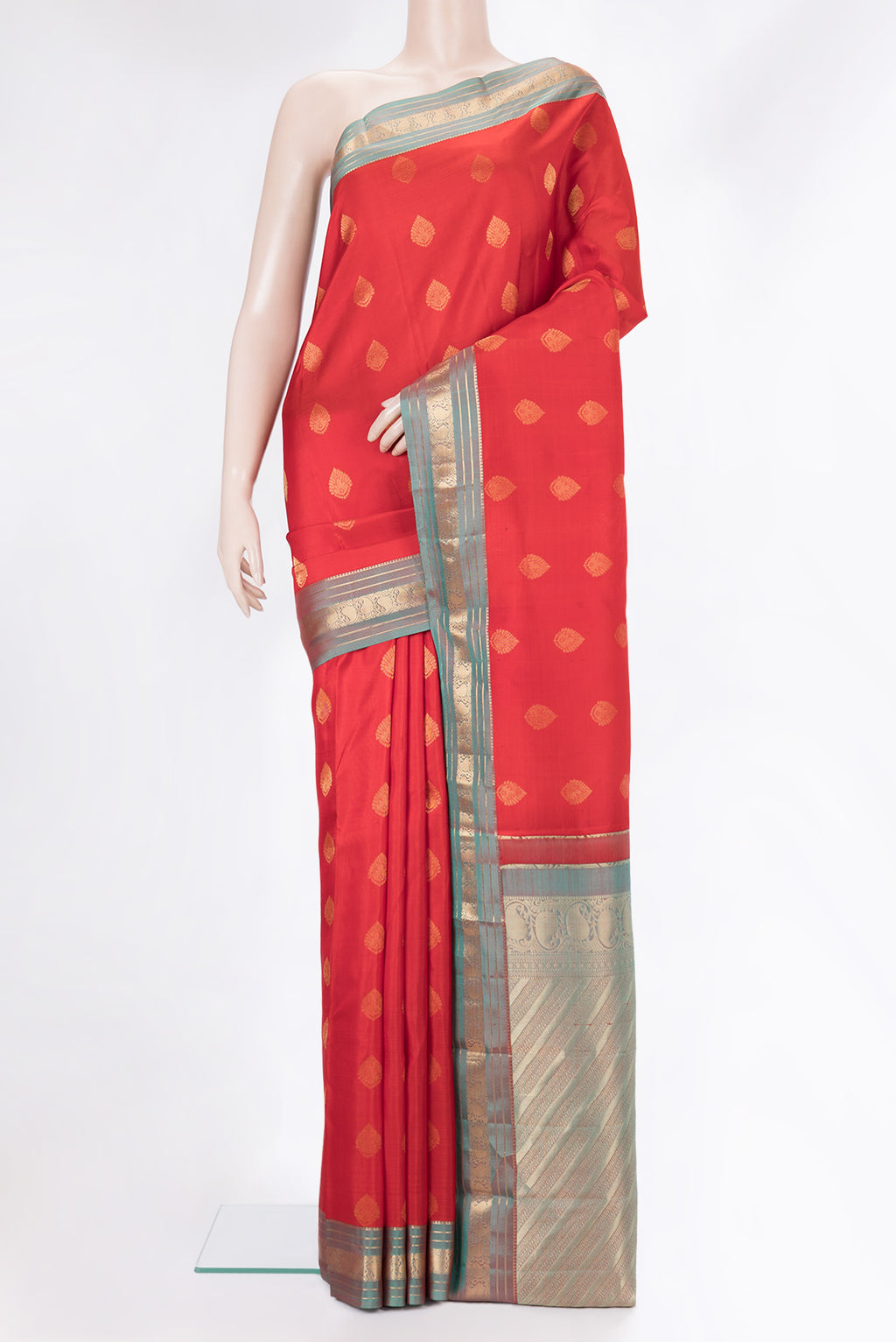 Pure Silk Red Kanchipuram Saree with Zari Butta on the body and Zari Border.  displayed on a mannequin