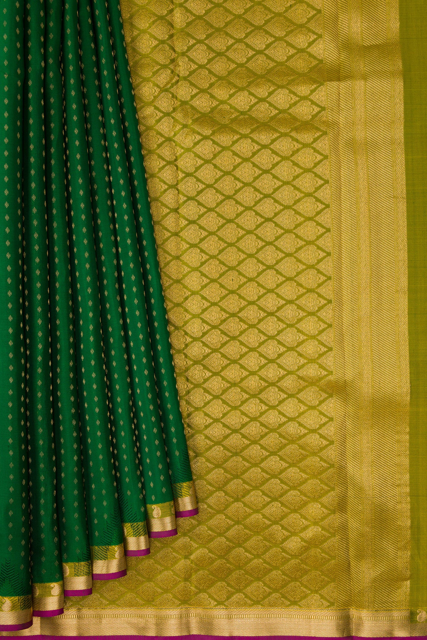 Pleats and pallu of Green Kanchipuram Silk Saree with Zari Butta on the body and Zari Border. 