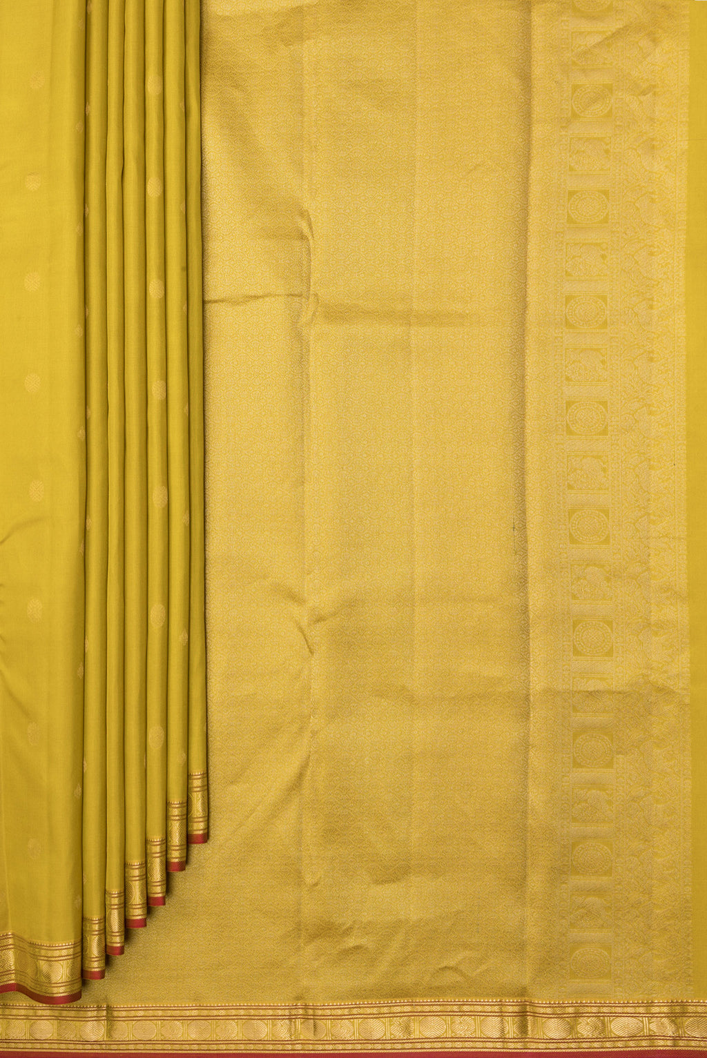 Pleats and pallu of Lemon Yellow Kanchipuram Silk Saree with Zari Butta on the body and Zari Border. 