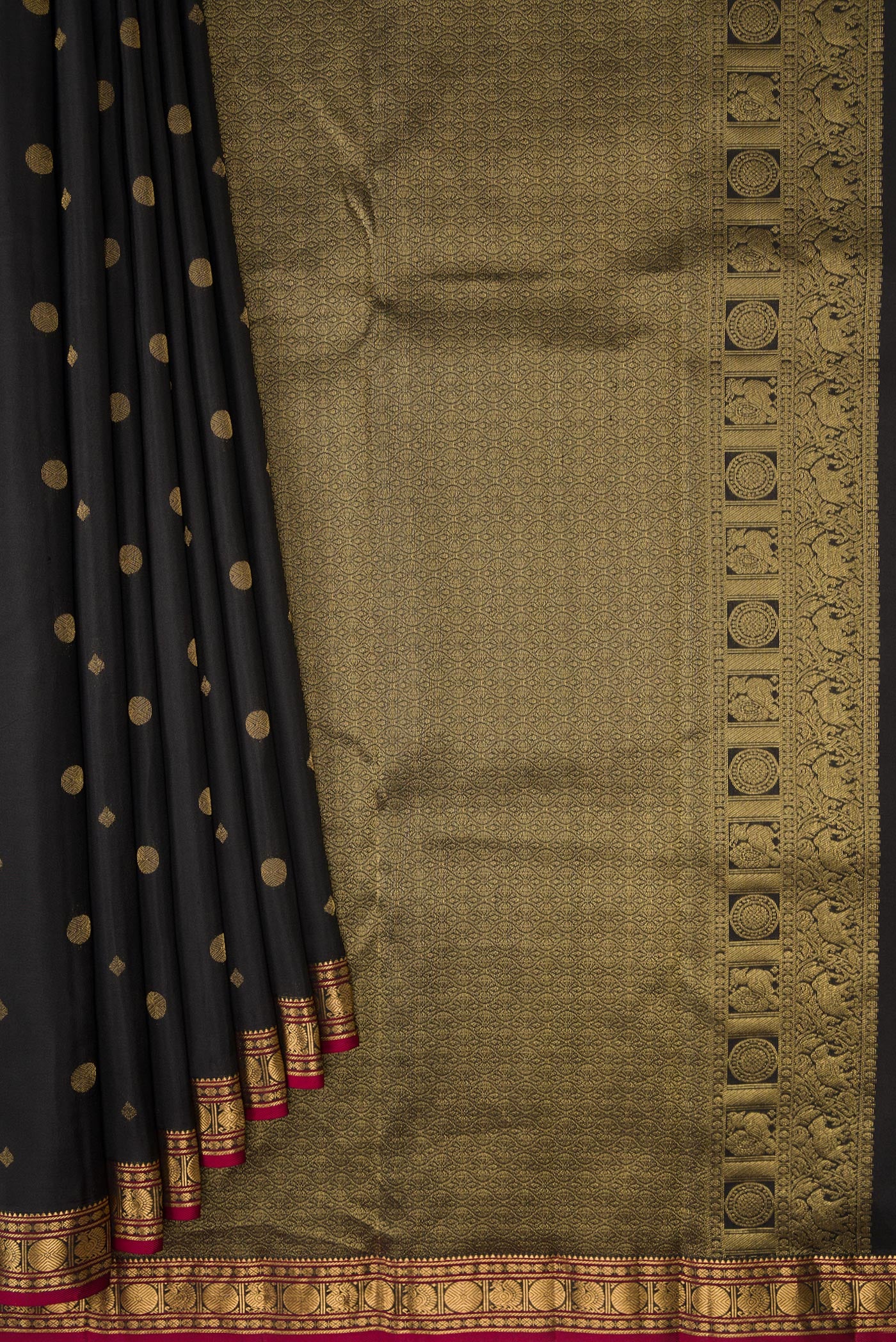 Pleats and pallu of Black Kanchipuram Silk Saree with Zari Butta on the body and Zari Border. 