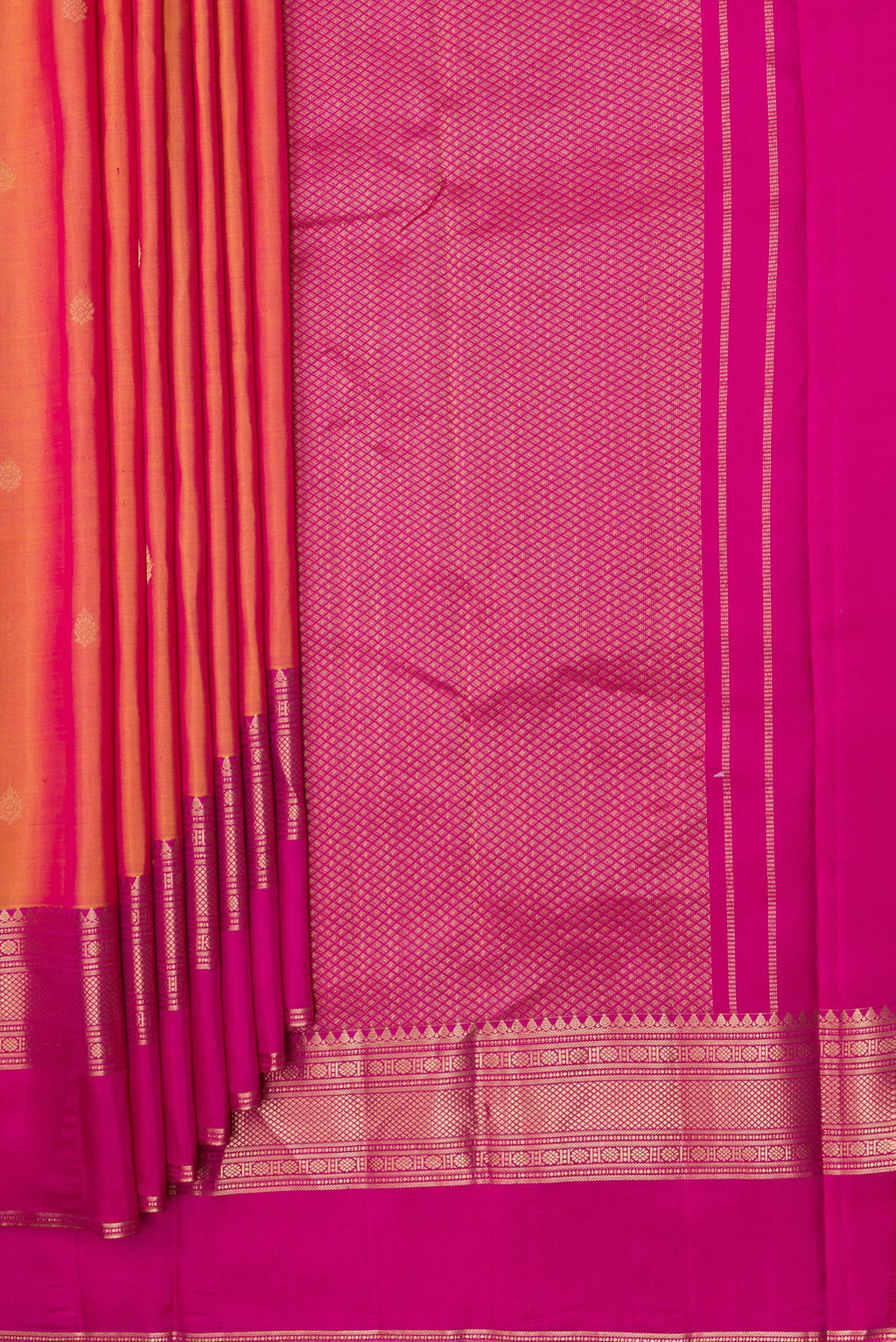 Pleats and pallu of Pinkish Yellow Dual Tone Kanchipuram Silk Saree with Zari Butta on the body and Ganga Jamuna Border. 
