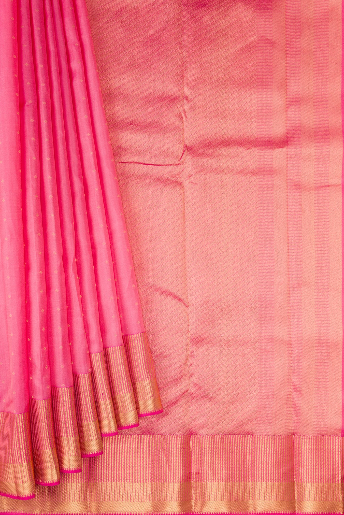 Pleats and pallu of Pink Kanchipuram Silk Saree with Zari Butta on the body and Zari Border. 