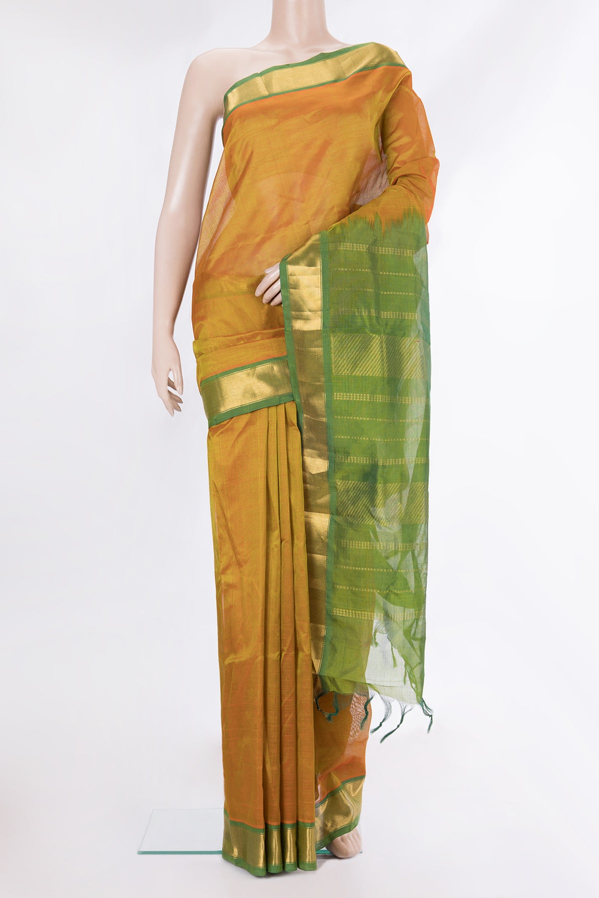 Mustard Dual Tone Silk Cotton Saree with Plain Body and Zari Border.  displayed on a mannequin