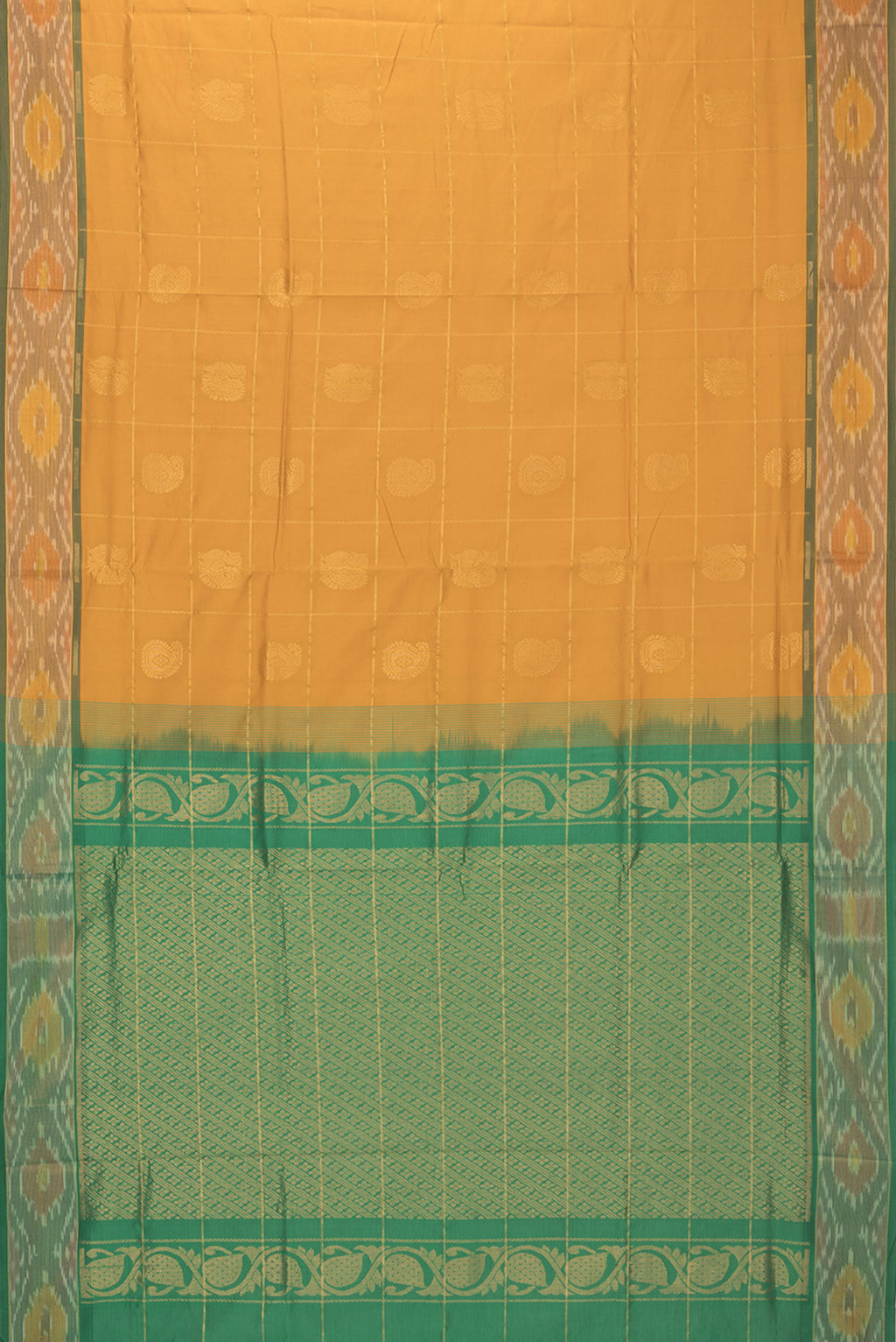 Flat view of Mustard Silk Cotton Saree with Checked design on the body and Ikat Border. 