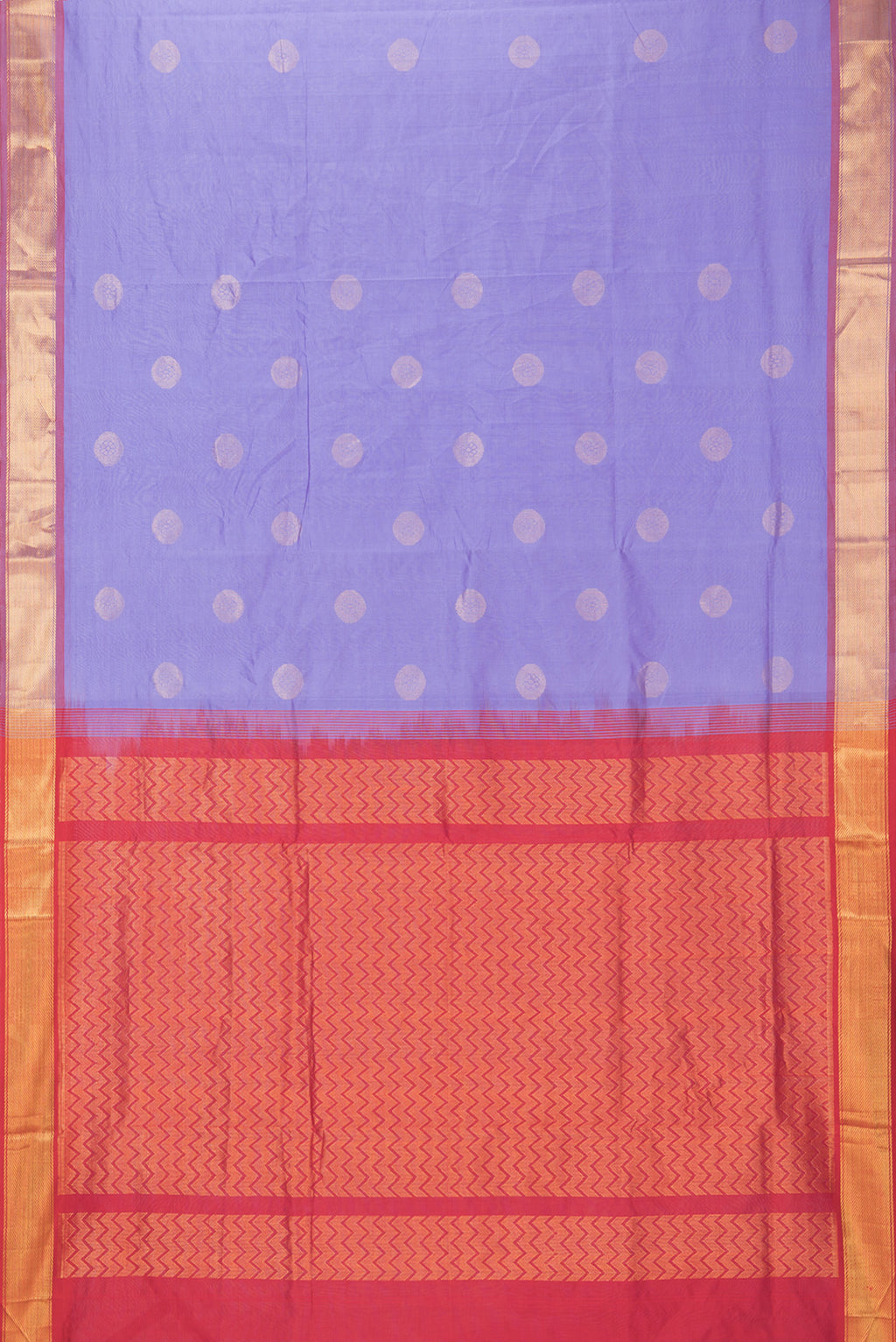 Flat view of Lavender Silk Cotton Saree with Zari Butta on the body and Zari Border. 