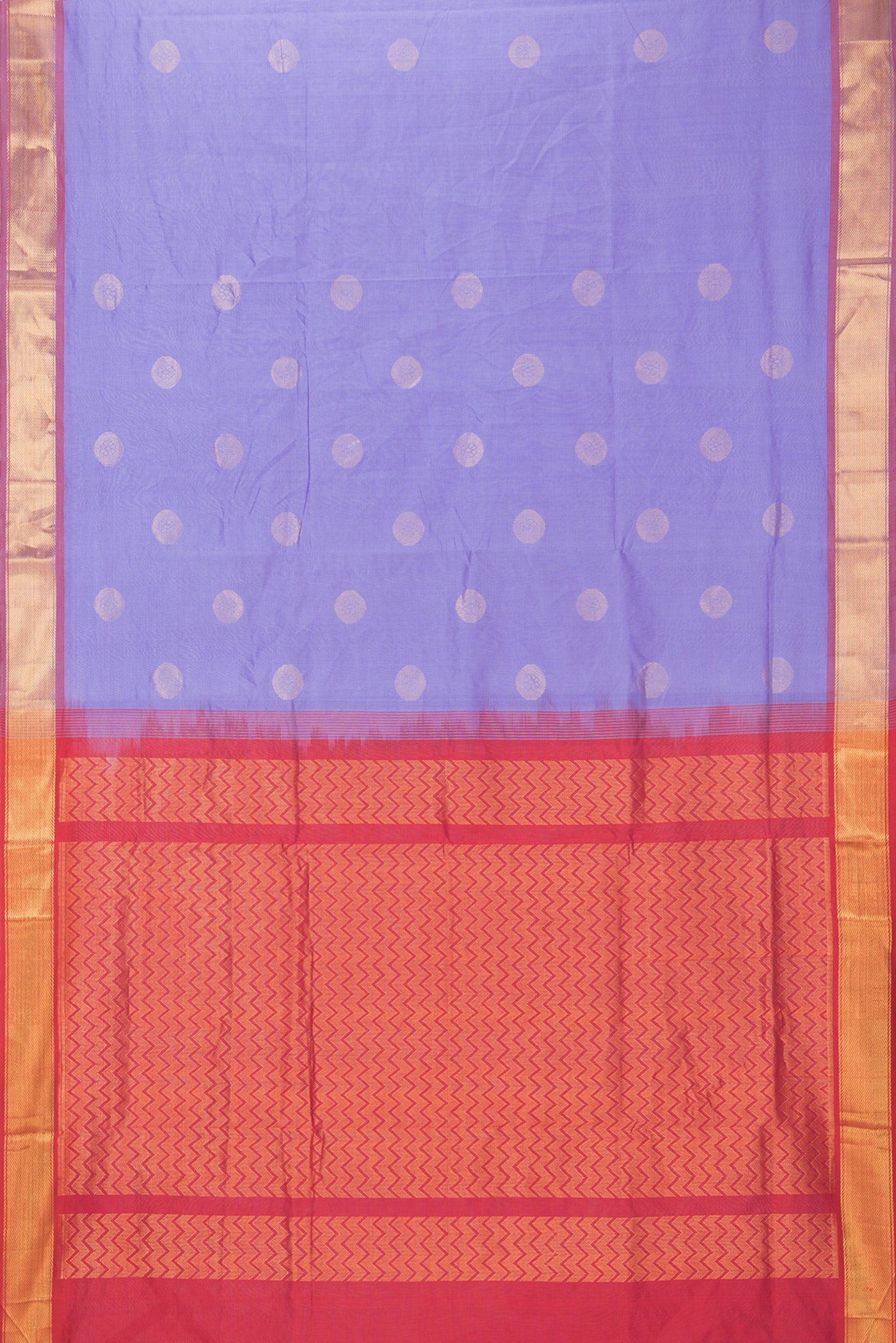 Flat view of Lavender Silk Cotton Saree with Zari Butta on the body and Zari Border. 