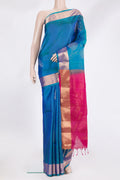 Pure Silk Peacock Blue Soft Saree with Zari Butta on the body and Zari Border.  displayed on a mannequin
