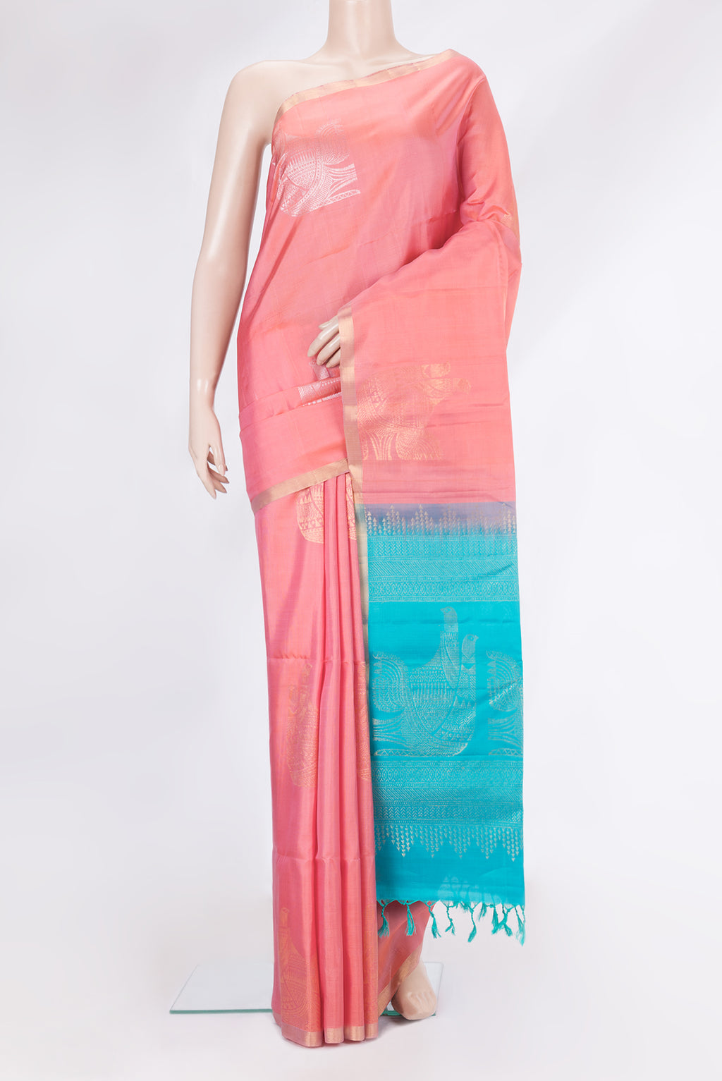 Pink Soft Silk Saree with Zari Butta on the body and Zari Border.  displayed on a mannequin