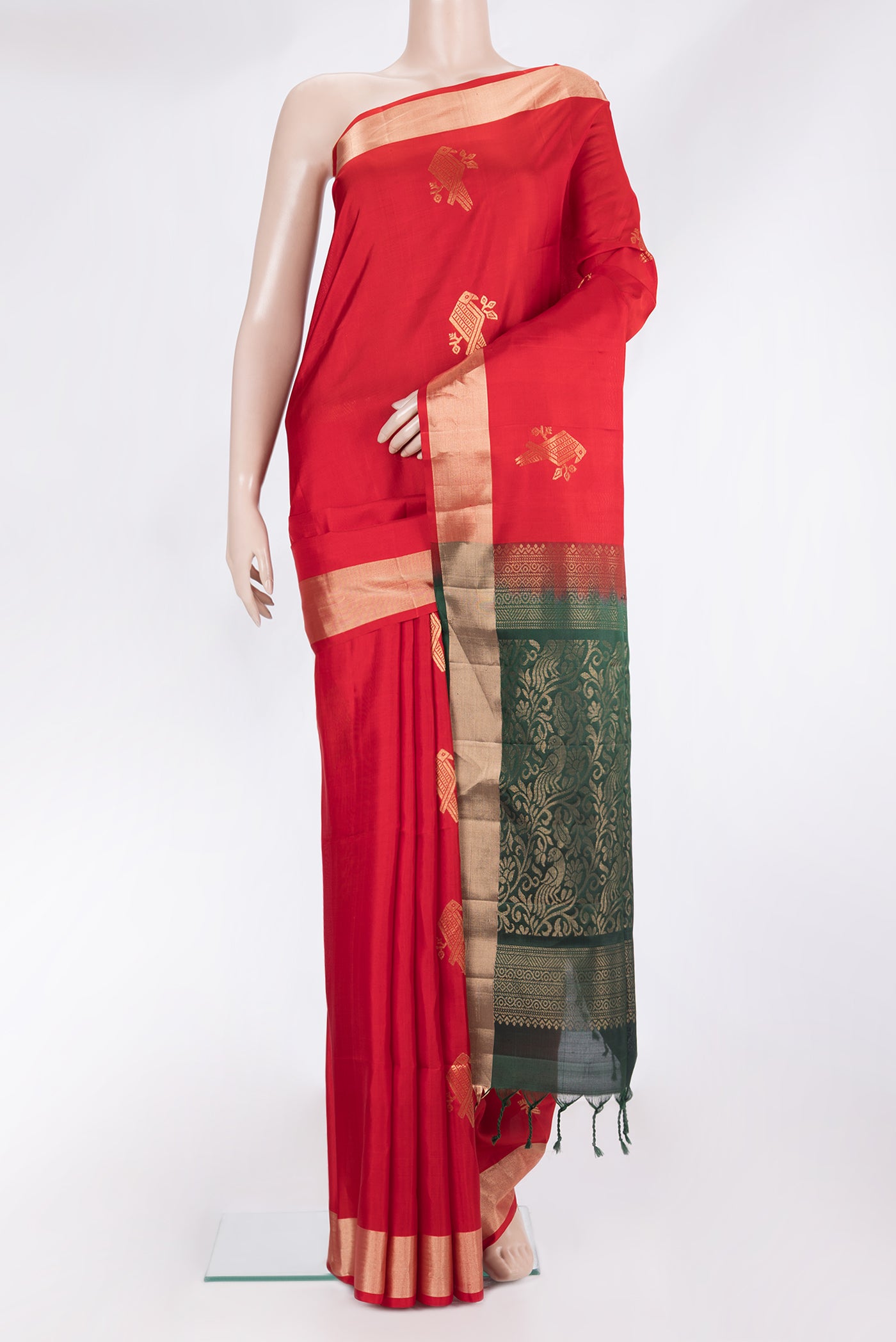 Pure Silk Red Soft Saree with Zari Butta on the body and Zari Border.  displayed on a mannequin
