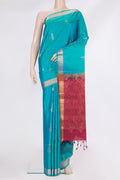 Pure Silk Sky Blue Soft Saree with Zari Butta on the body and Zari Border.  displayed on a mannequin