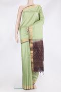 Pure Silk Pista Green Soft Saree with Zari Butta on the body and Zari Border.  displayed on a mannequin