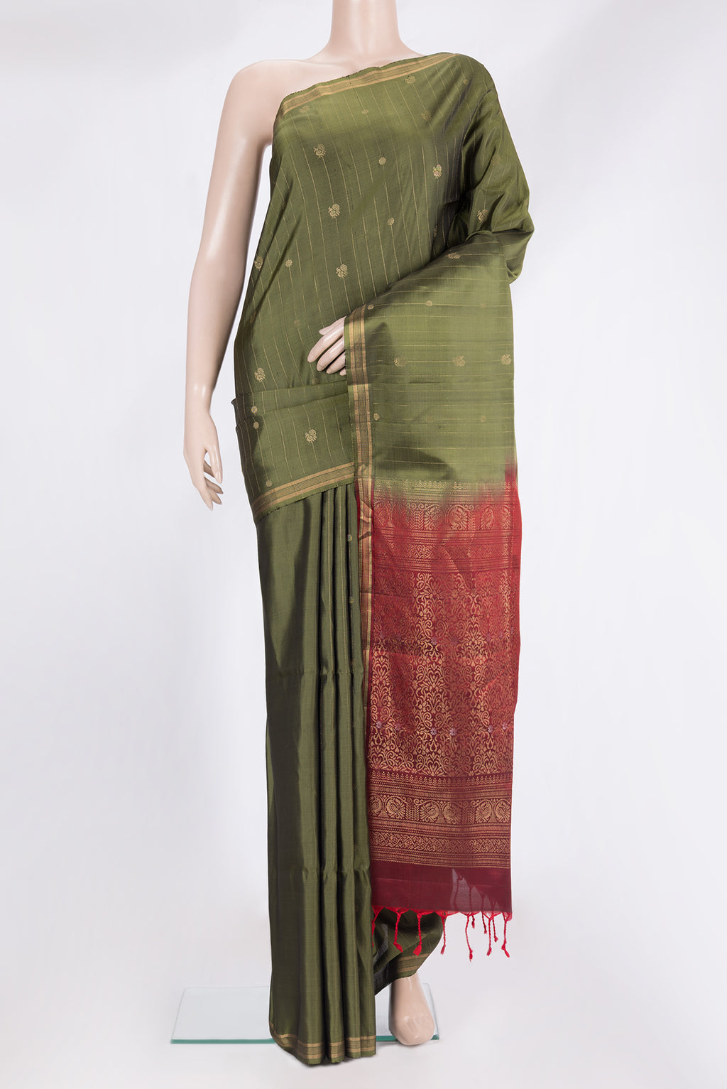 Pure Silk Mehandi Green Soft Saree with Stripes on the body and Zari Border.  displayed on a mannequin