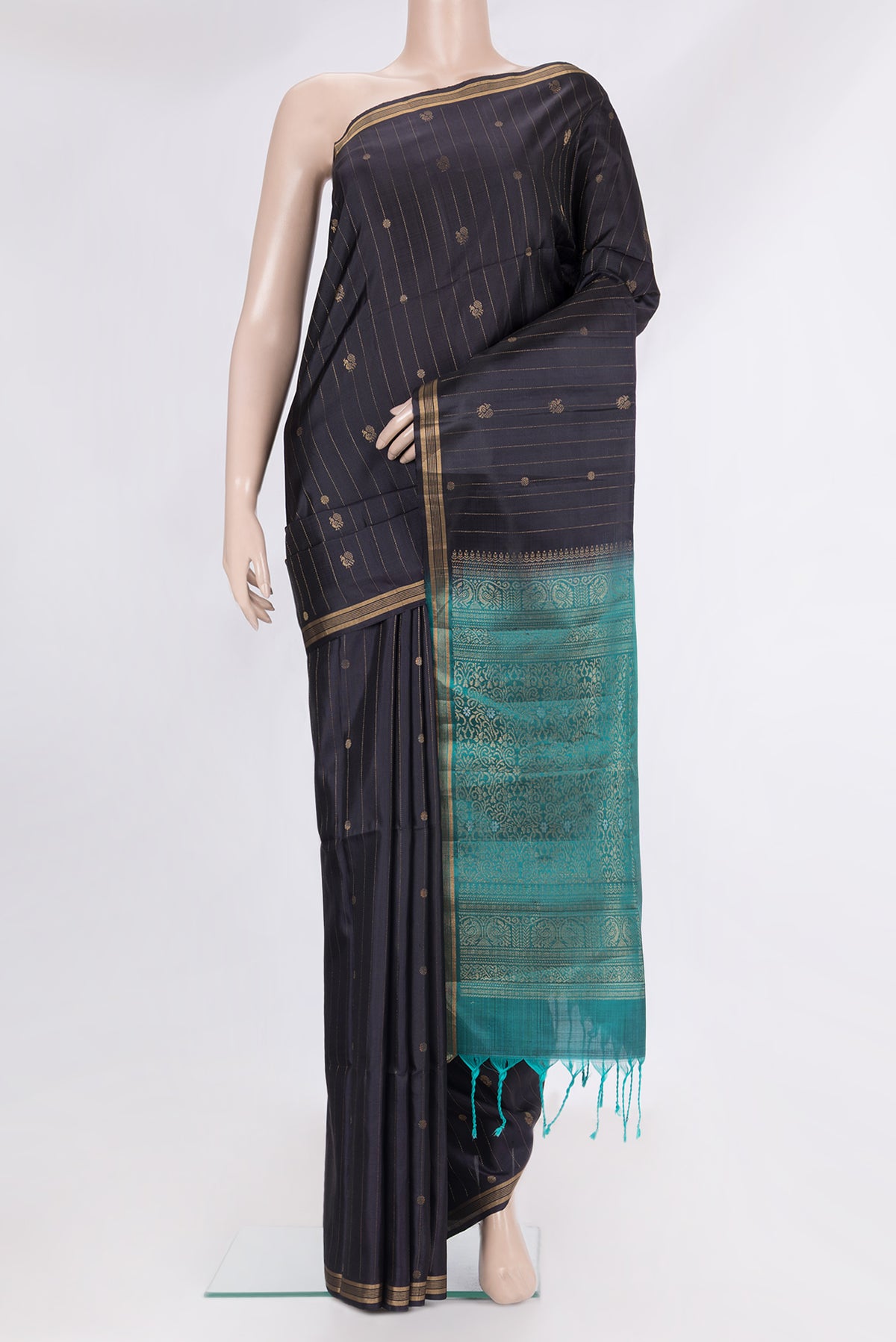 Pure Silk Black Soft Saree with Stripes on the body and Zari Border.  displayed on a mannequin