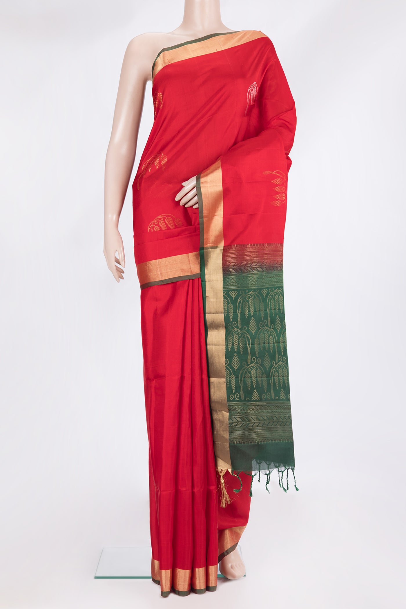 Pure Silk Red Soft Saree with Zari Butta on the body and Zari Border.  displayed on a mannequin