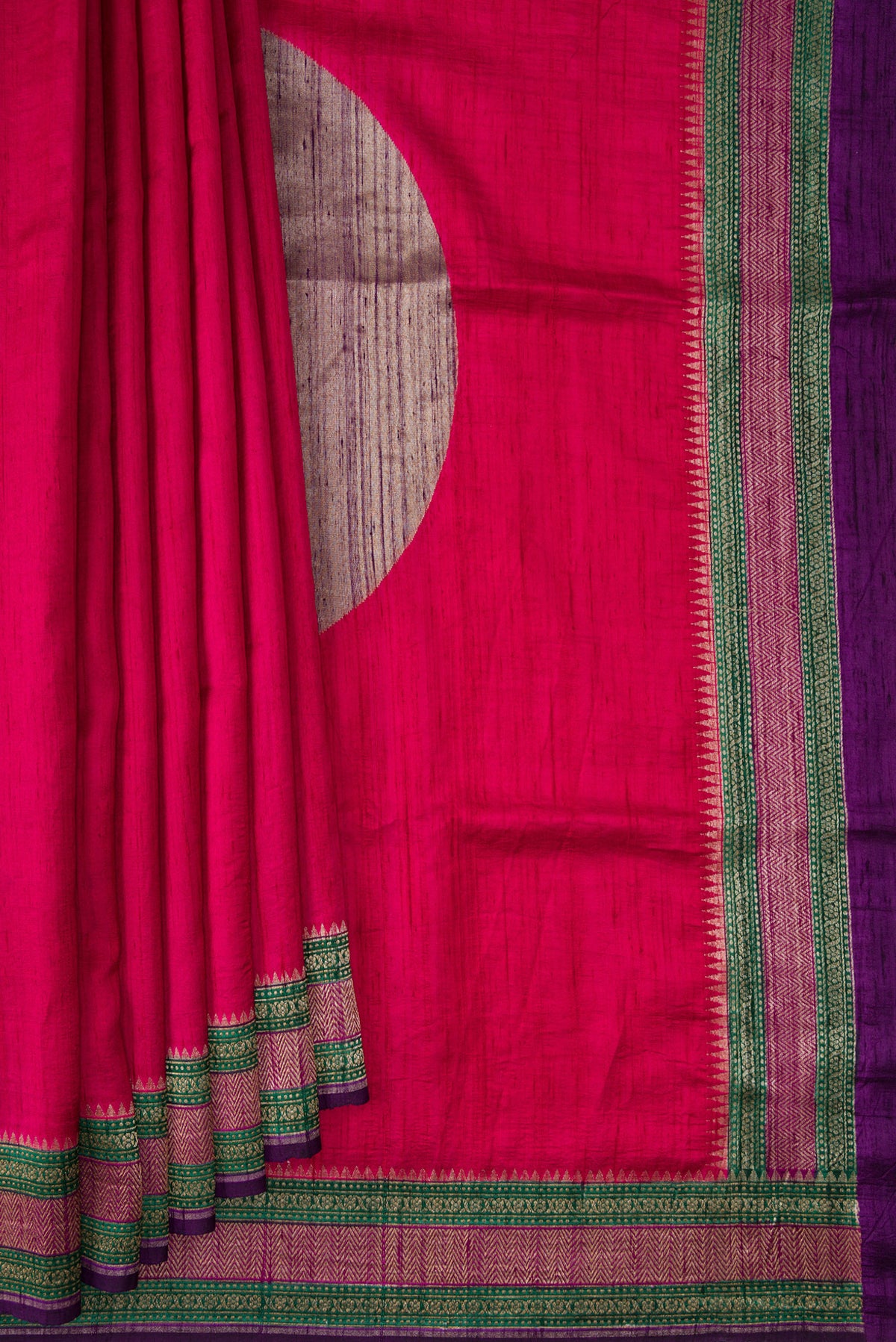 Pleats and pallu of Rani Pink Tussar Saree with Plain Body and Fancy Border. 