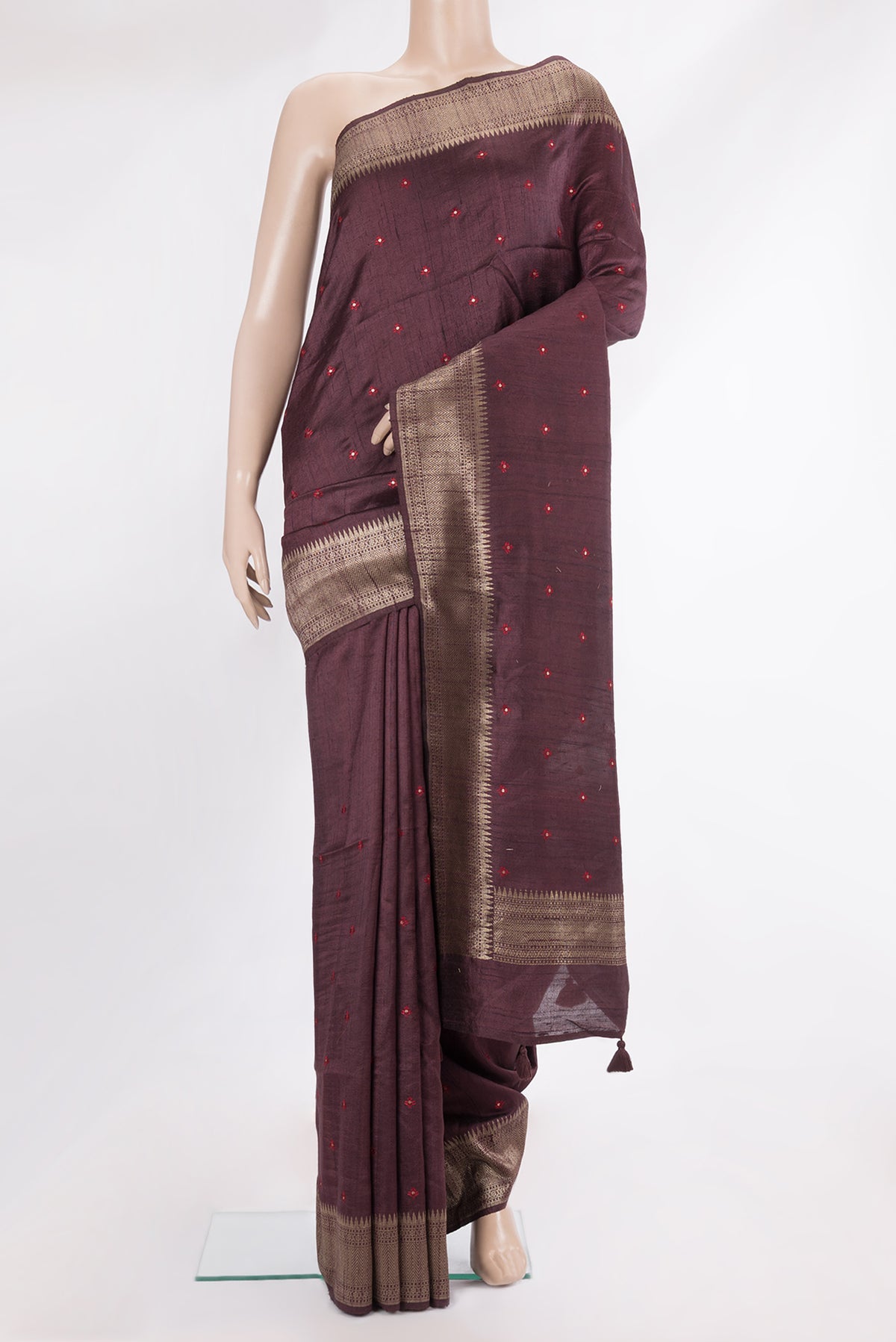Pure Silk Brown Raw Saree with Embroidery on the body and Zari Border.  displayed on a mannequin