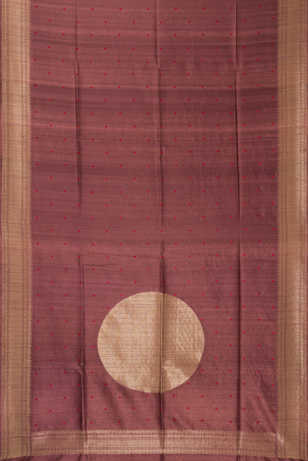 Flat view of Brown Tussar Saree with Thread Butta on the body and Fancy Border. 