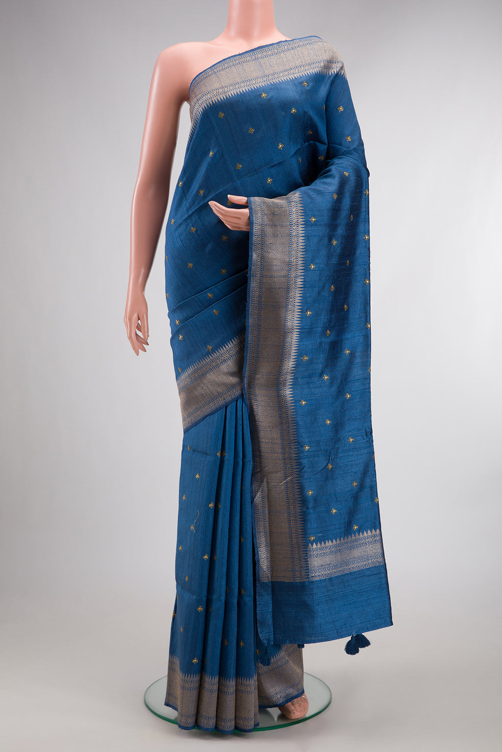 Blue Tussar Saree with Embroidered on the body and Fancy Border.  displayed on a mannequin