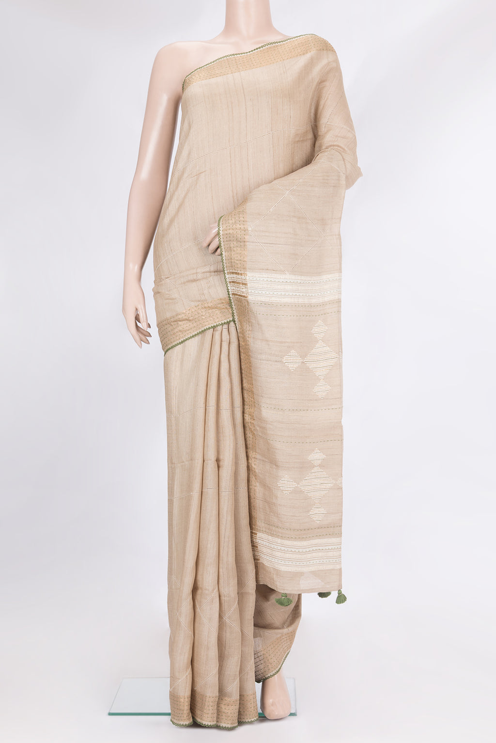 Pure Silk Beige Tussar Saree with Checked design on the body and Embroidery Border.  displayed on a mannequin