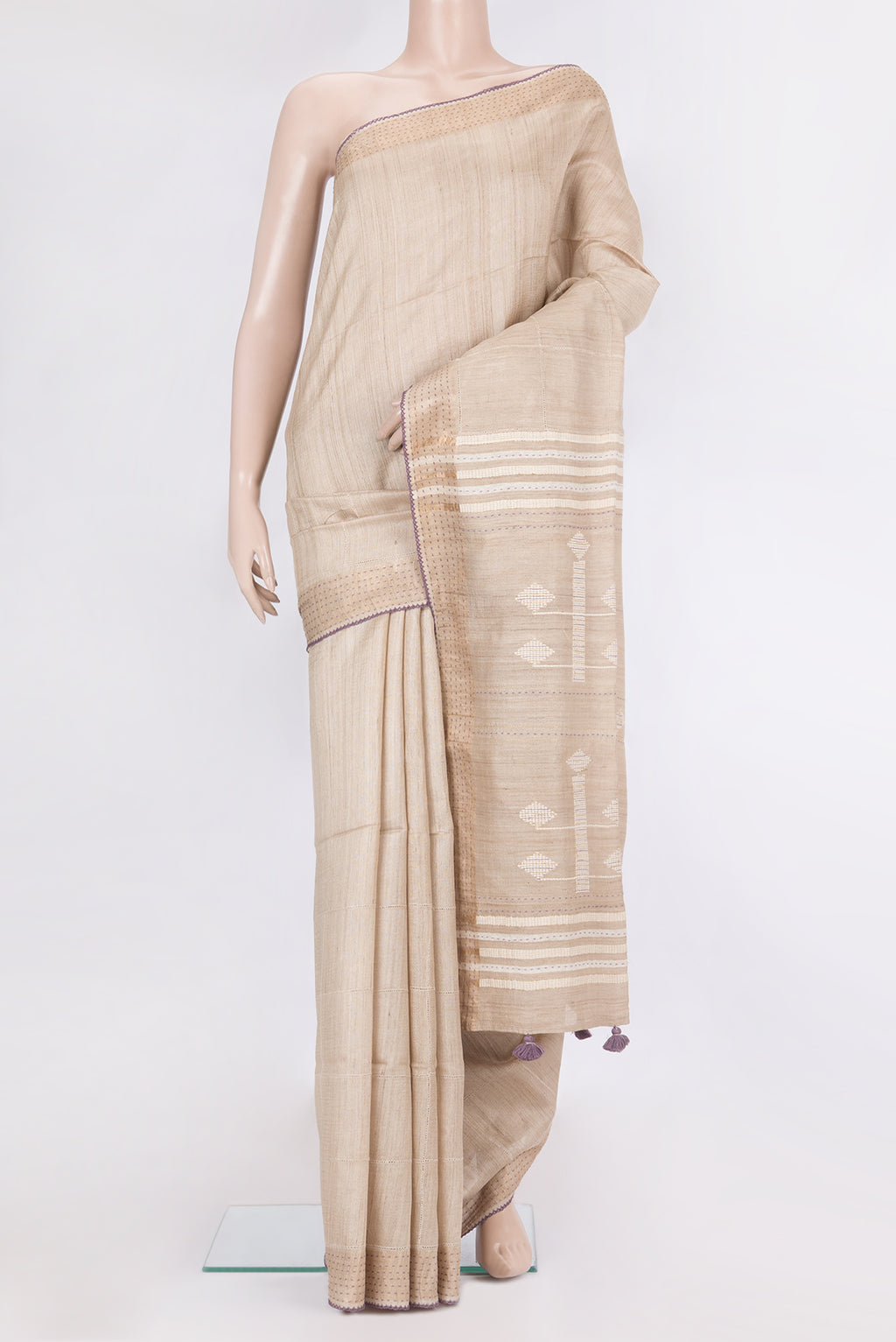 Pure Silk Beige Tussar Saree with Checked design on the body and Embroidery Border.  displayed on a mannequin
