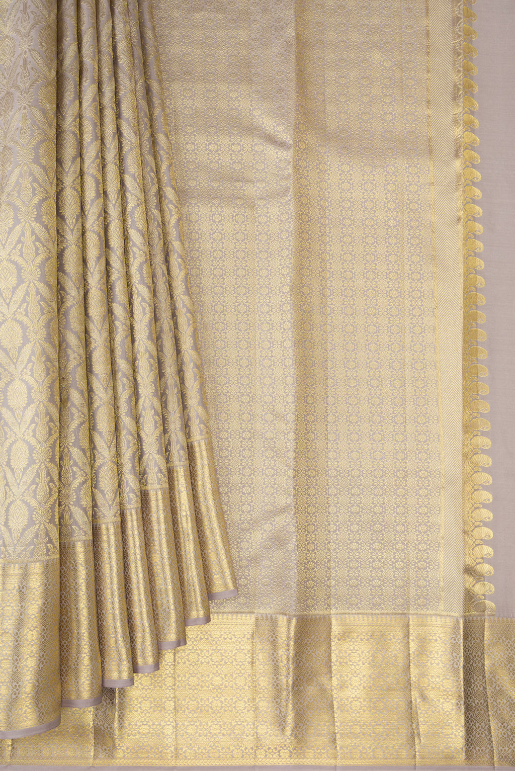 Pleats and pallu of Davys Grey Kanchipuram Silk Saree with Zari Brocade on the body and Zari Border. 